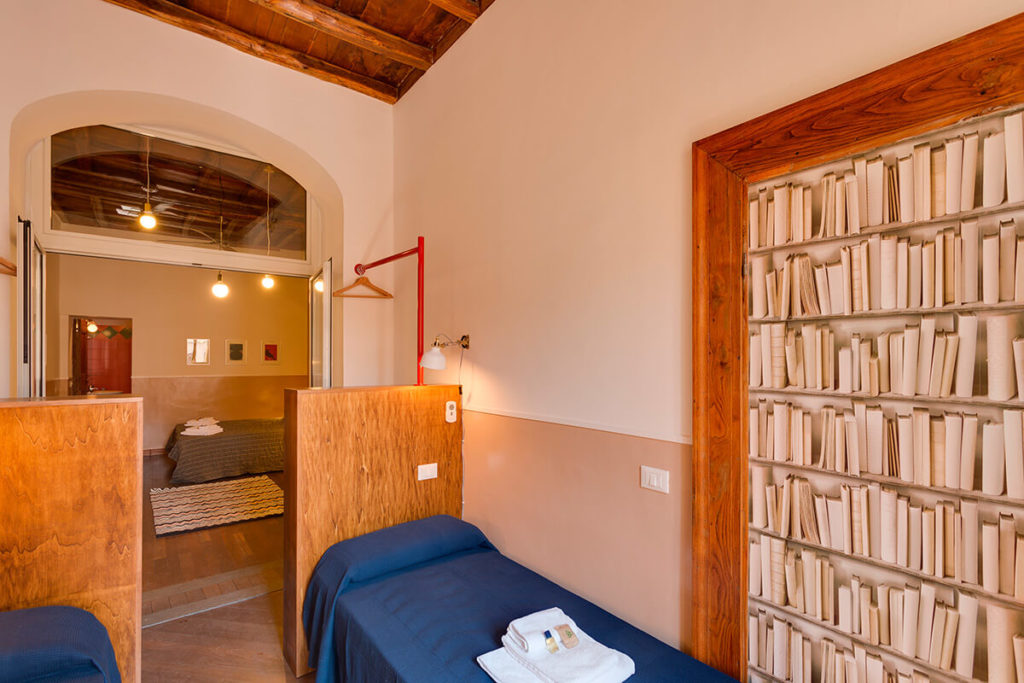 The family suite, with an attached children's room with 2 single beds and an ensuite bath